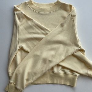 TNA pale yellow sweatshirt